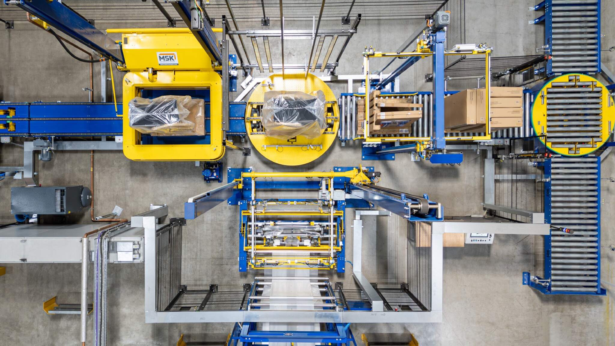 Un système de rétraction de housses entièrement automatisé.